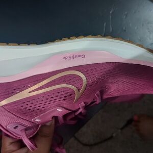 Nike Pink and Gold Athletic Shoes with Wavy Sole